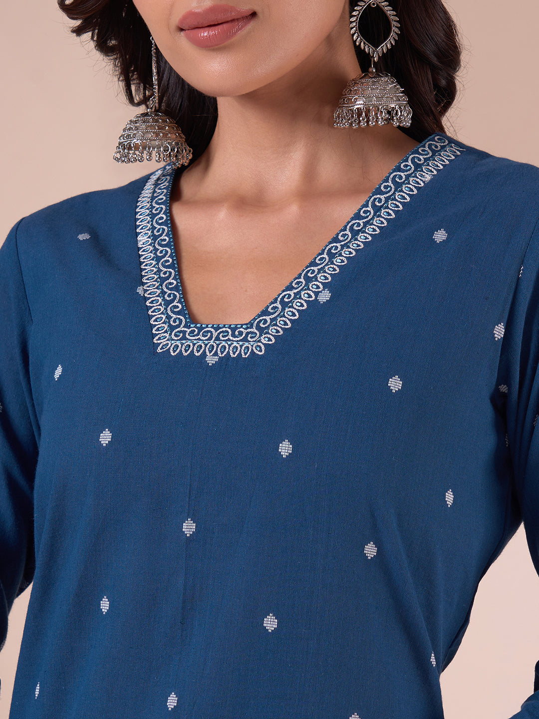 Cotton Dobby Straight Kurta Set with Resham Embroidery and Striped Kantha Pants.