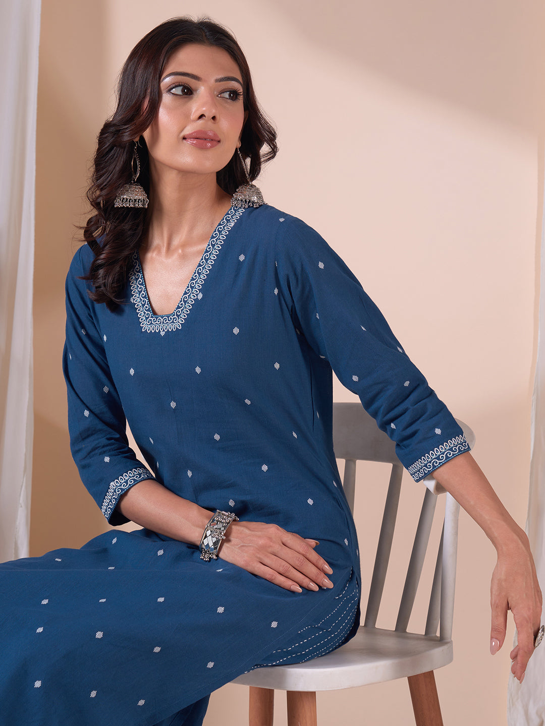 Cotton Dobby Straight Kurta Set with Resham Embroidery and Striped Kantha Pants.
