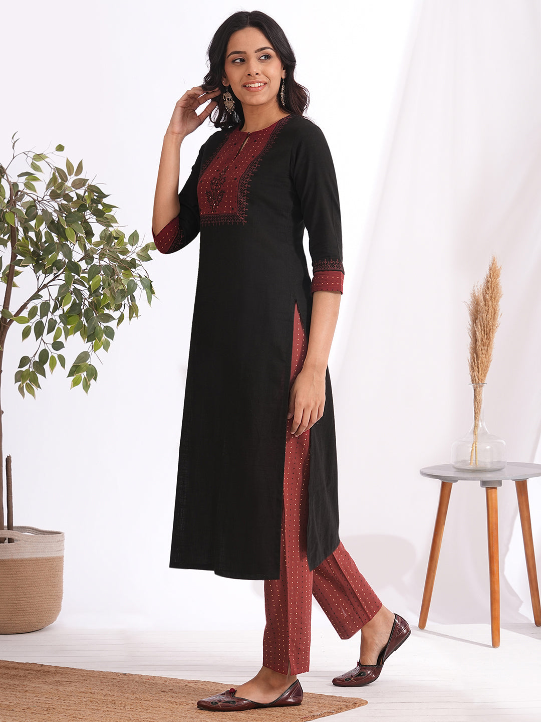 Straight fit kurta set with Yoke and sleeves highlighted with block print and handwork