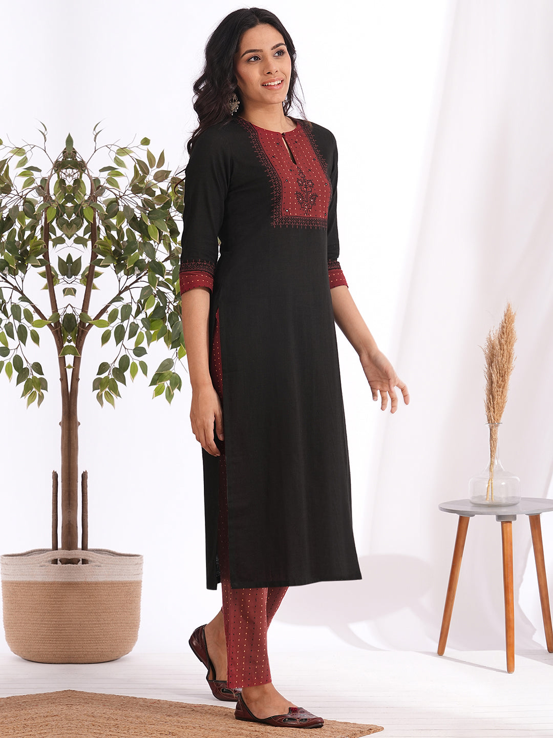 Straight fit kurta set with Yoke and sleeves highlighted with block print and handwork