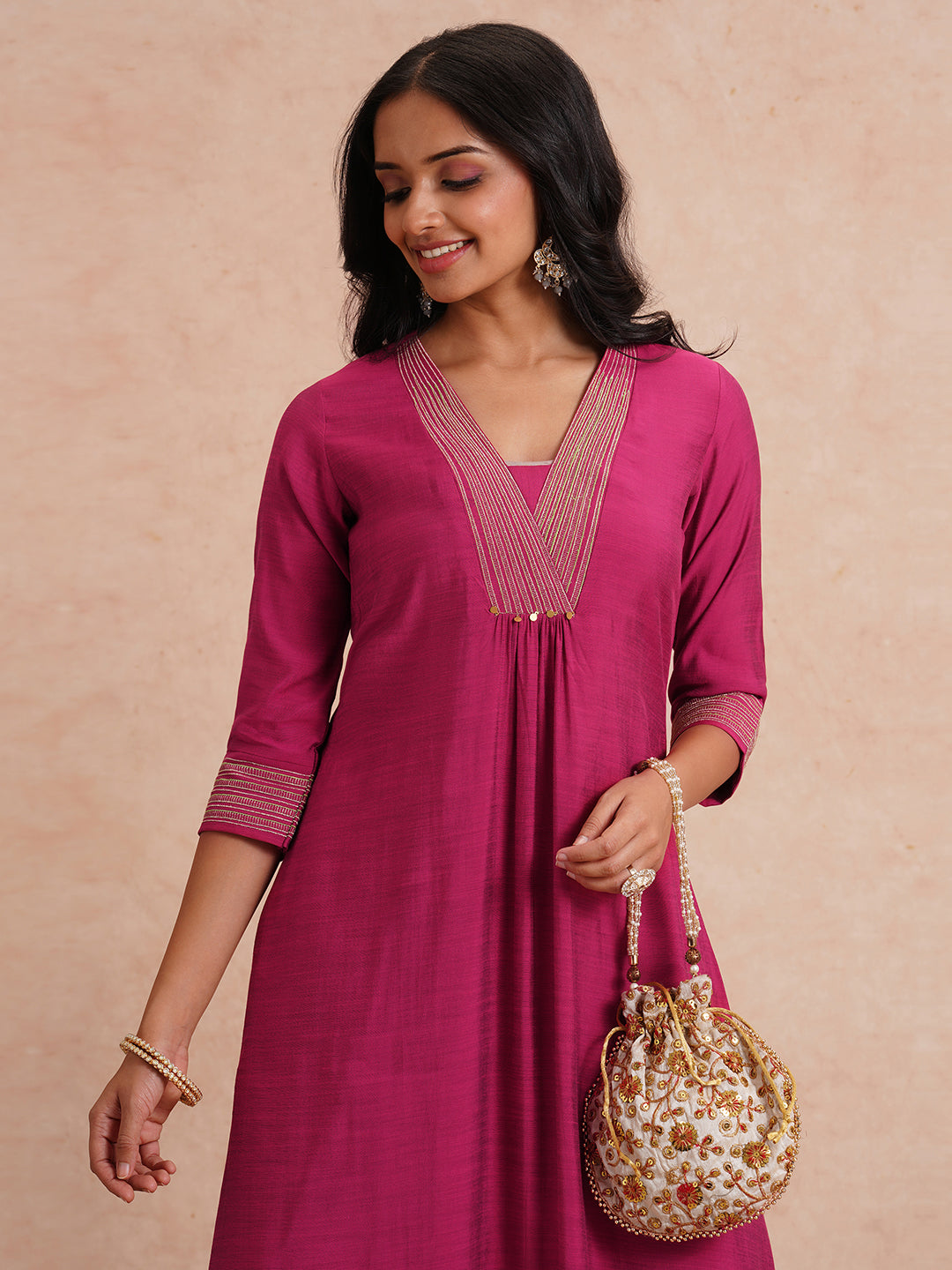 Party Edit- Flared kurta set with embroidered neck and cuff paired with palazzo.