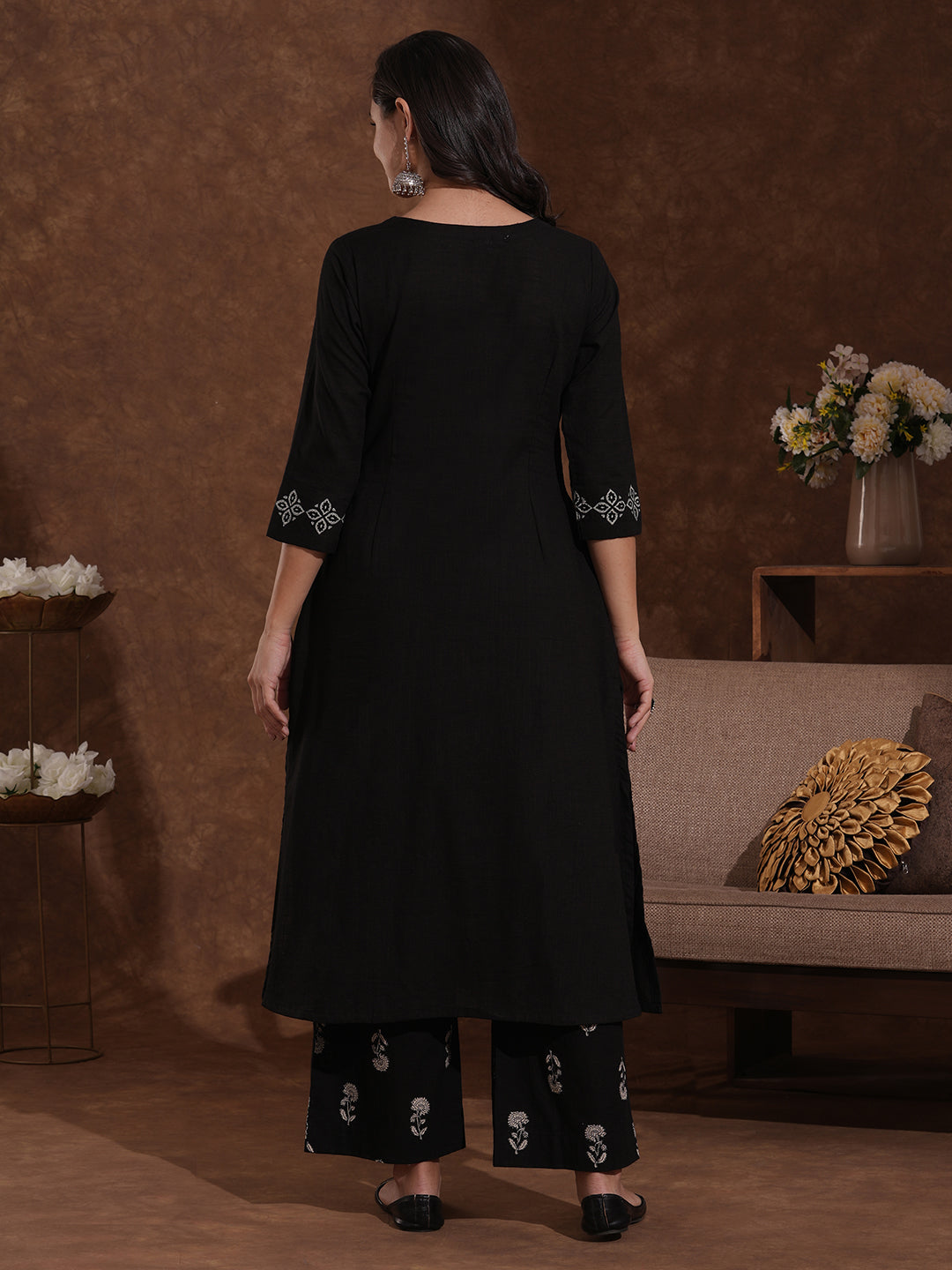 A-line kurta with block printed front and sleeves paired with printed palazzos.