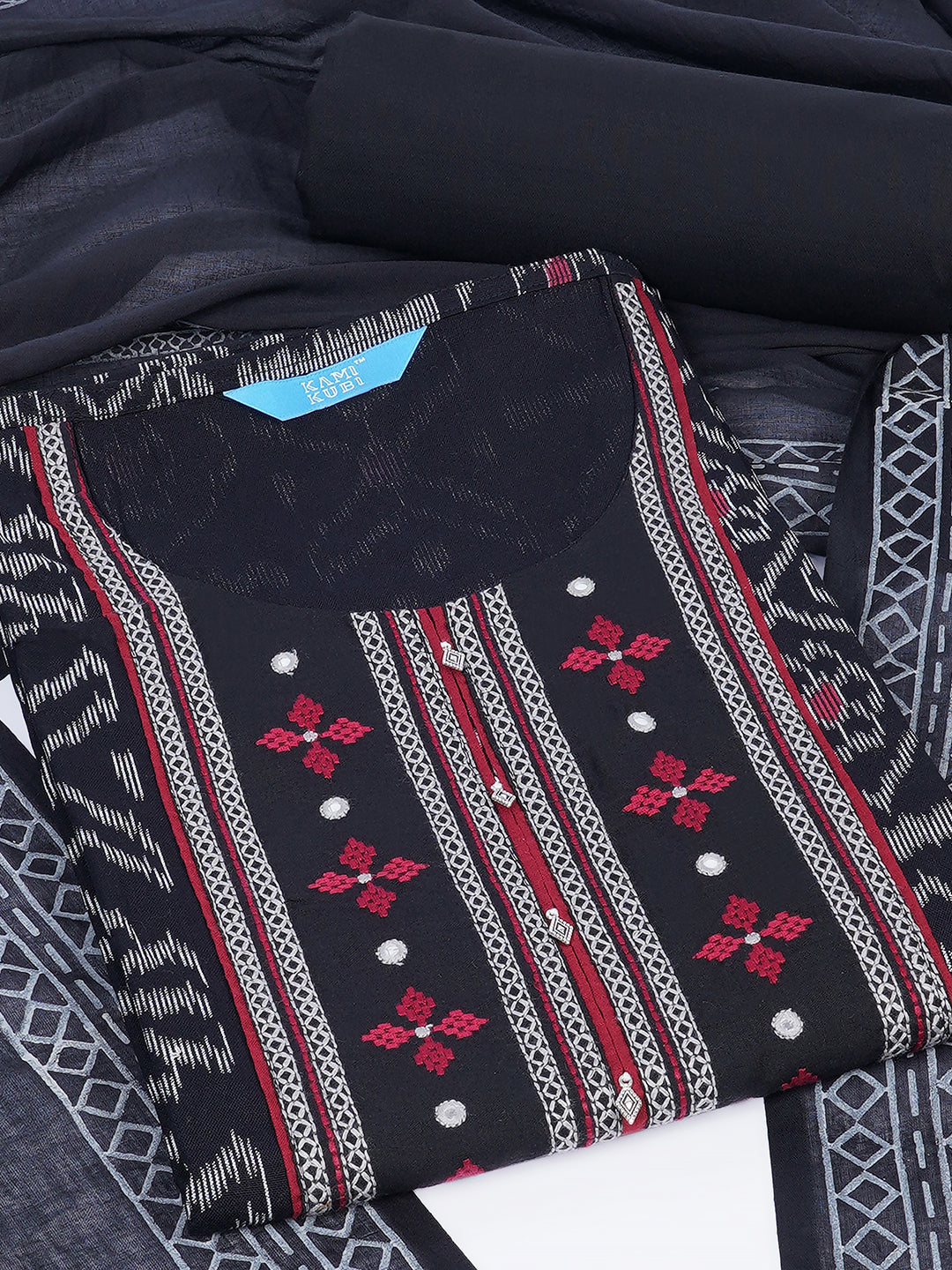 Cotton Ikat embroidered suit set with plain bottom and printed dupatta.
