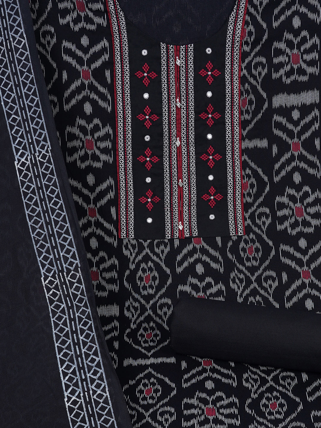 Cotton Ikat embroidered suit set with plain bottom and printed dupatta.