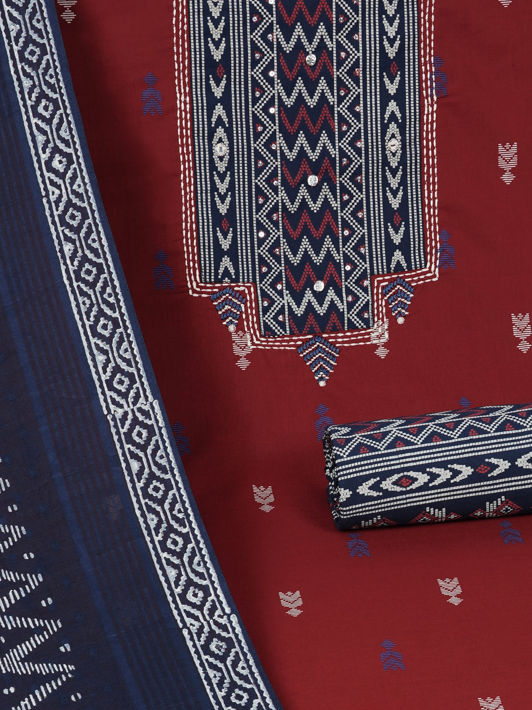 3-piece unstitched suit set featuring a butti-printed kurta with coordinated yoke detailing.