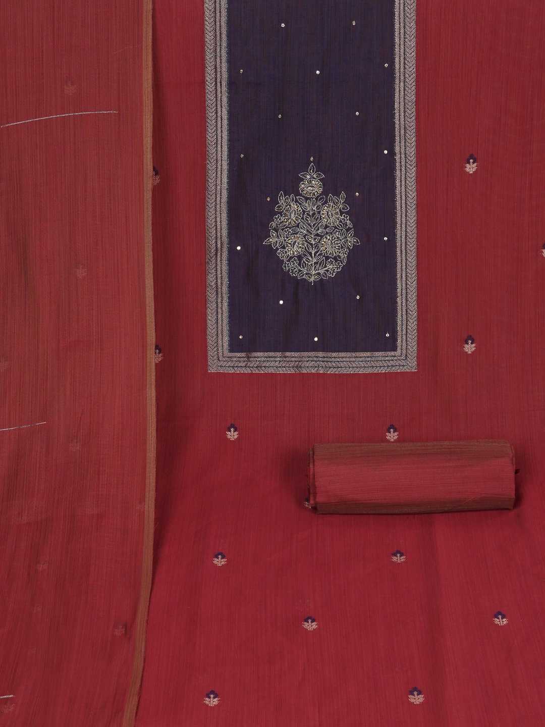 Unstitched suit set in elegant tussar silk featuring a contrast blue yoke with delicate zari work.(Maroon)