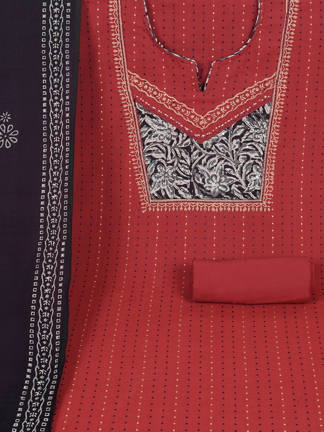 Unstitched suit set crafted in dobby fabric features a handcrafted Kalamkari printed patch.