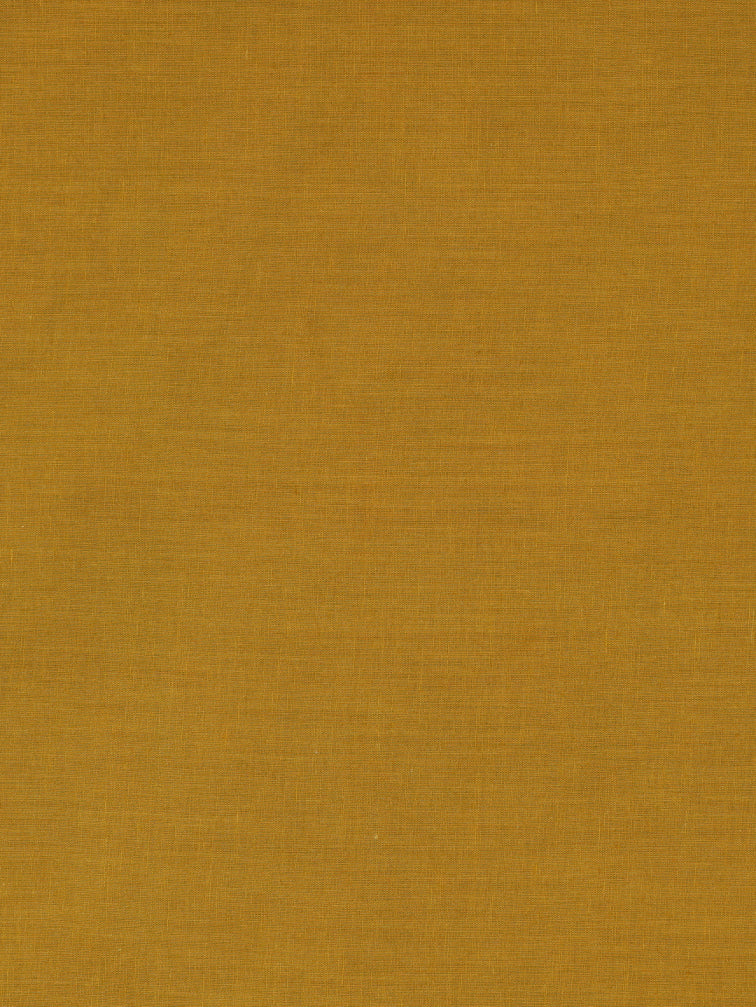 Unstitched suit set crafted in dobby fabric features a handcrafted Kalamkari printed patch.