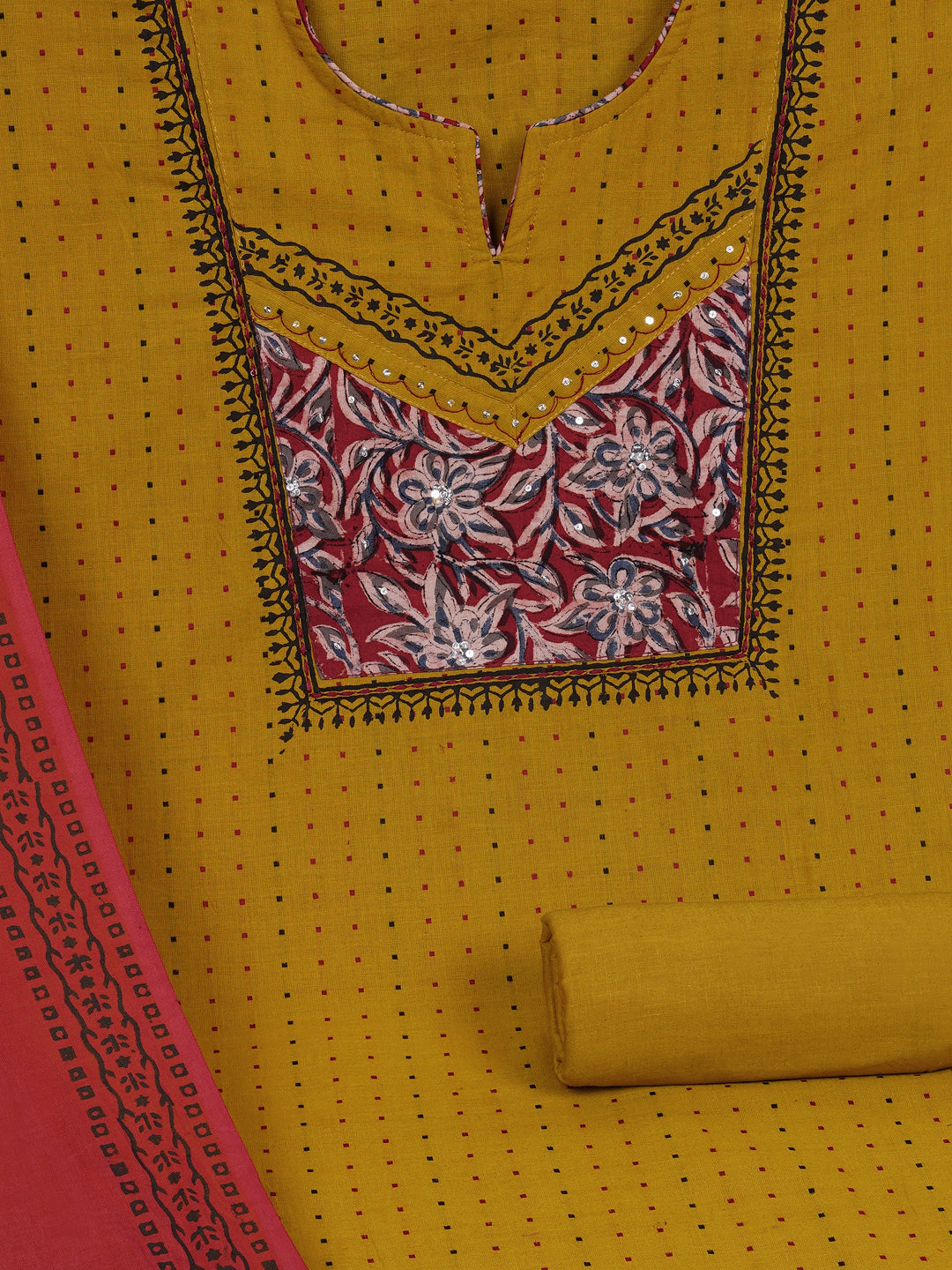 Unstitched suit set crafted in dobby fabric features a handcrafted Kalamkari printed patch.