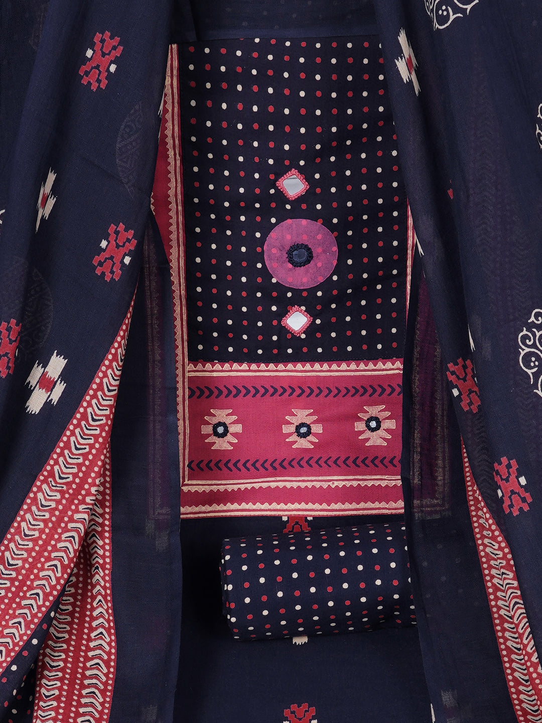 Unstitched suit set featuring a contrast yoke crafted in block print fabric and delicate handwork.