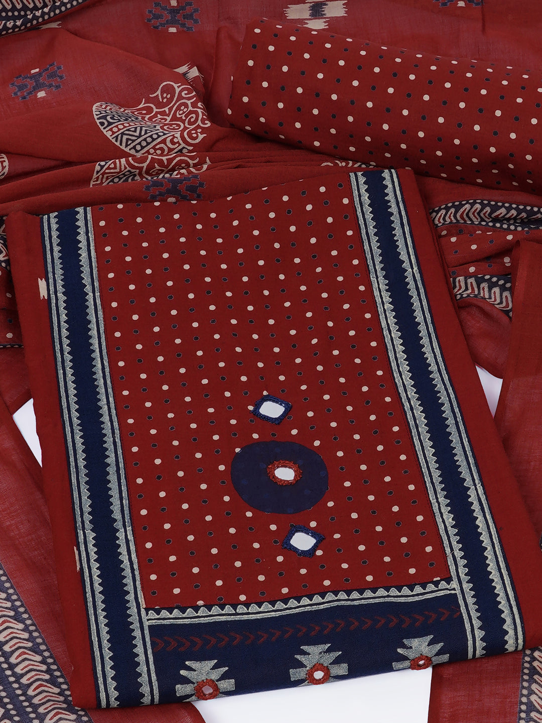 Unstitched suit set featuring a contrast yoke crafted in block print fabric and delicate handwork.