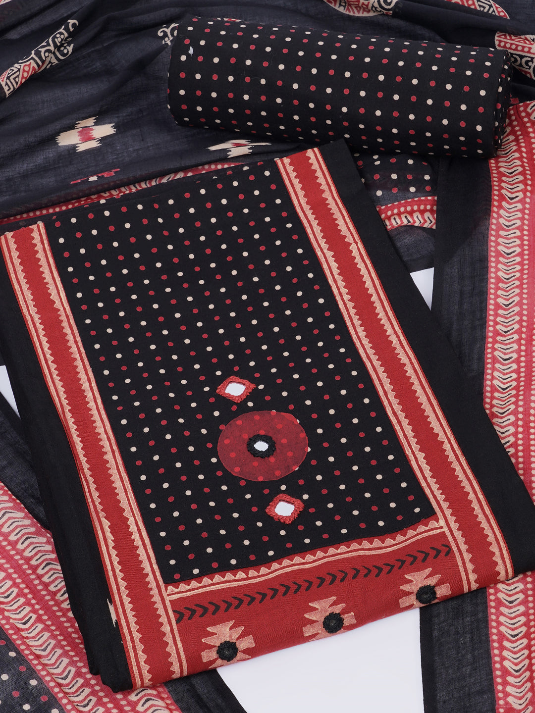 Unstitched suit set featuring a contrast yoke crafted in block print fabric and delicate handwork.