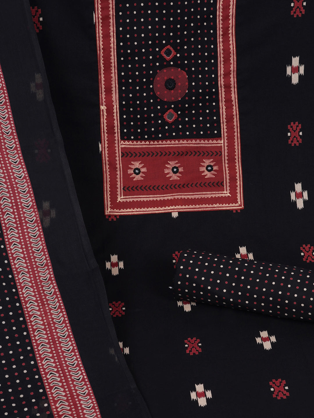 Unstitched suit set featuring a contrast yoke crafted in block print fabric and delicate handwork.