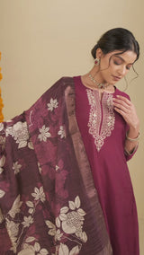 Embroidered A line silk blend kurta paired with printed dupatta and lined pants.