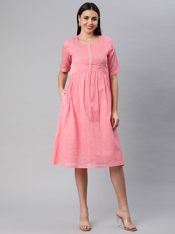 Cotton mul half sleeve dress with pintuck yoke and buttoned placket