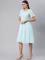 Cotton mul half sleeve dress with pintuck and buttoned placket