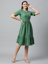 Cotton dobby half sleeve dress with gathering and buttoned placket