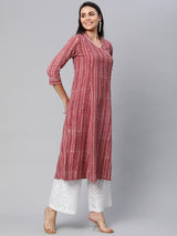 Udaan - Flared printed cotton kurta with mock overlap and lace detailing