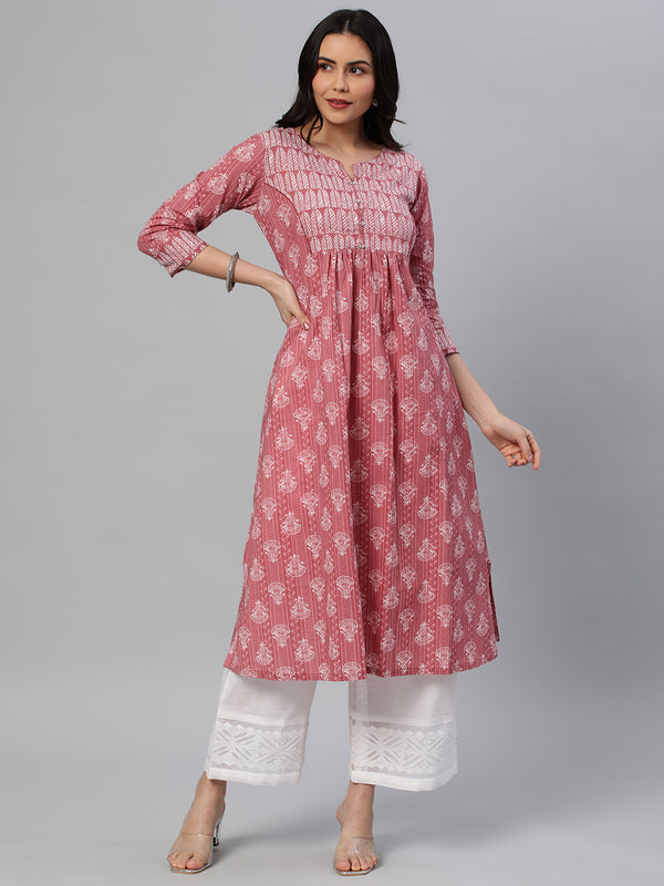 Udaan - A line printed cotton kurta with gathering detail highlighted with button.