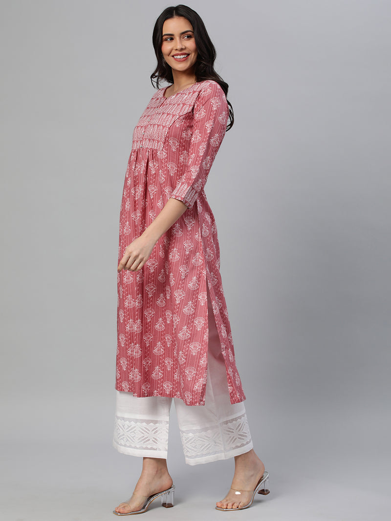 Udaan - A line printed cotton kurta with gathering detail highlighted with button.