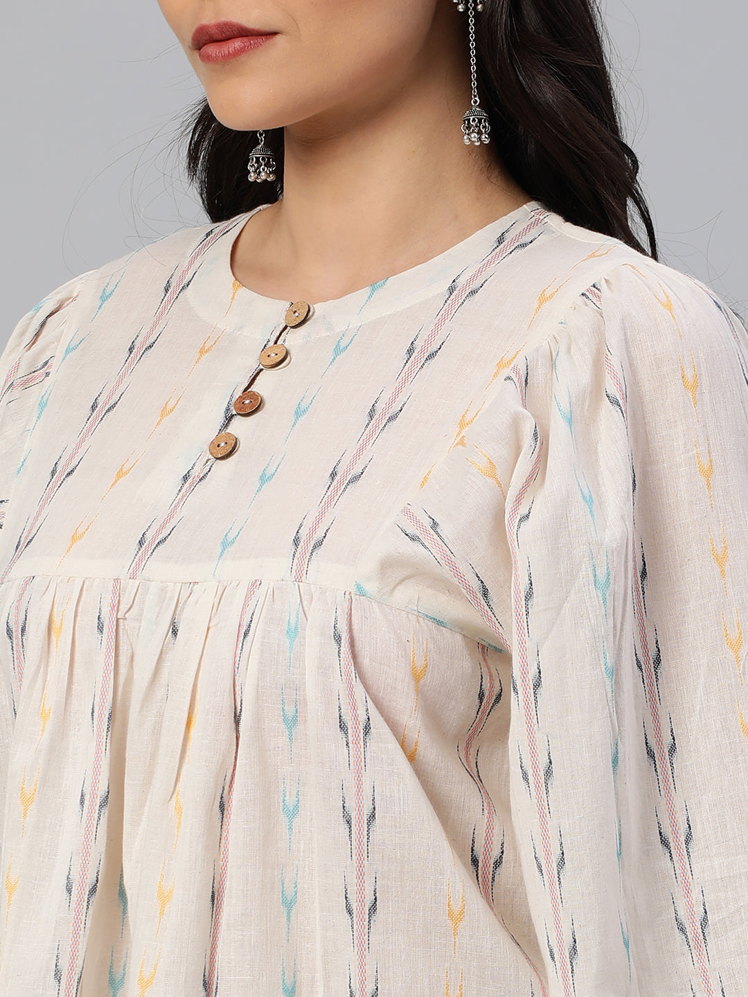 Flared cotton top with gathering detail on sleeve