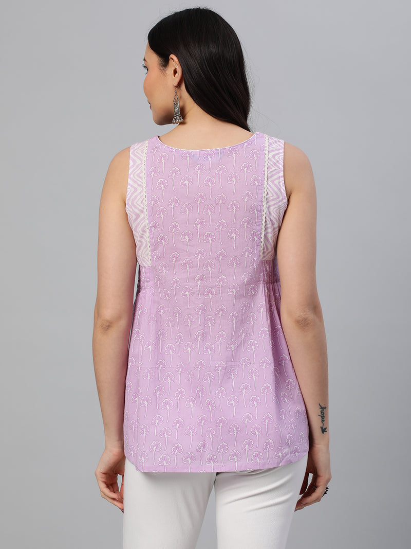 Flared printed cotton top with pleat and lace detailing.