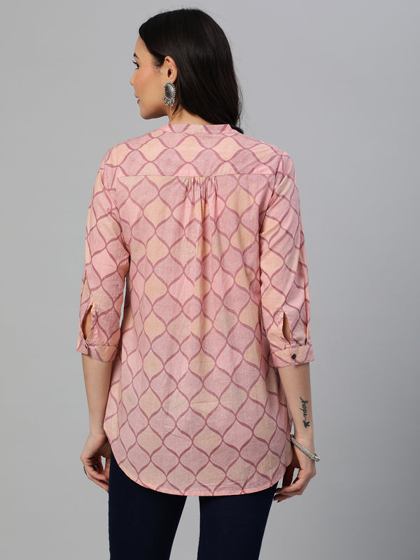 Flared printed cotton top with stand collar, knife pleat and button detailing.