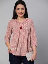 Flared cotton top with gathering details and tassels.(Maroon)