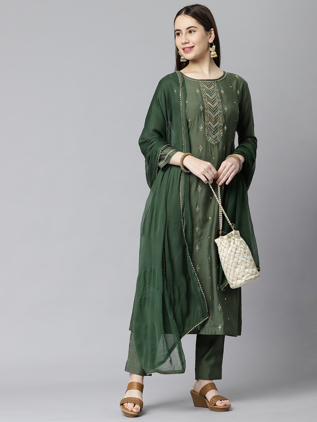 Party Edit- A line silk blend kurta with embroidered neck paired with dupatta and self tone bottom