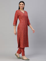 VAMA - Silk blend straight fit embroidered V neck kurta with pleat details on sleeves .