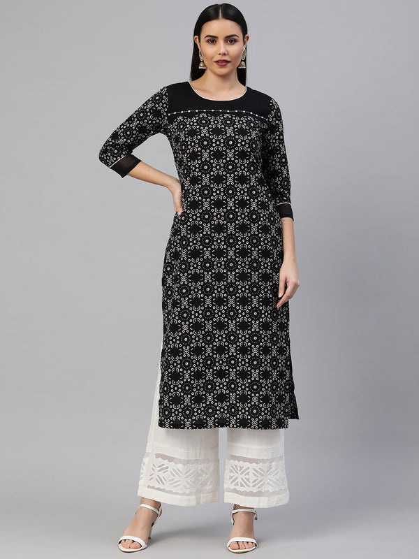 Straight fit cotton printed kurta with handwork detailing.